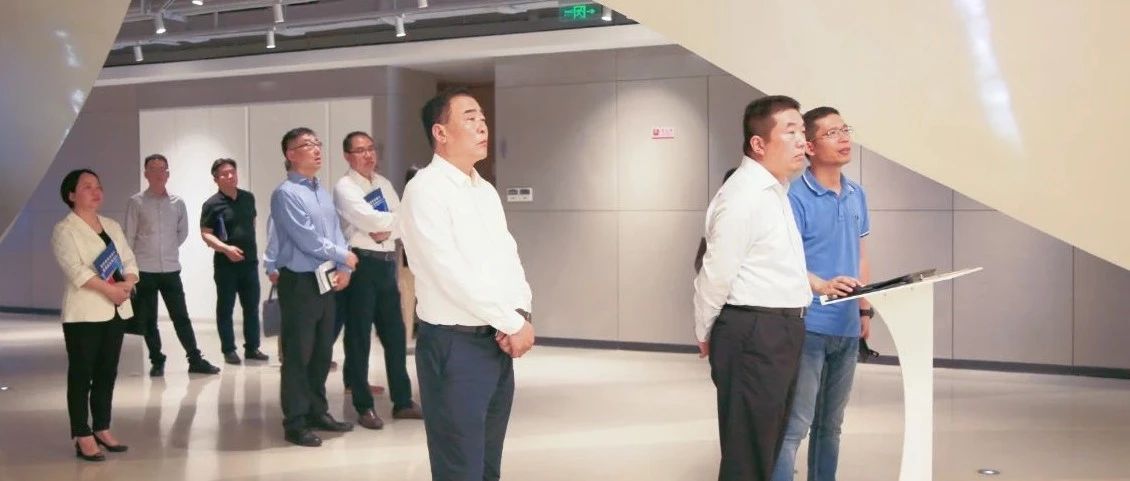 上海市市场监督治理局党组书记、局长倪俊南一行到多彩联盟科技调研